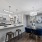 Modern Kitchen With Breakfast Bar At The Victor Verdae Apartments