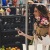 Woman Holding Flowers At Farmers Market