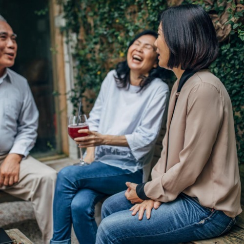 a lifestyle you'll love Friends Sitting Around Laughing