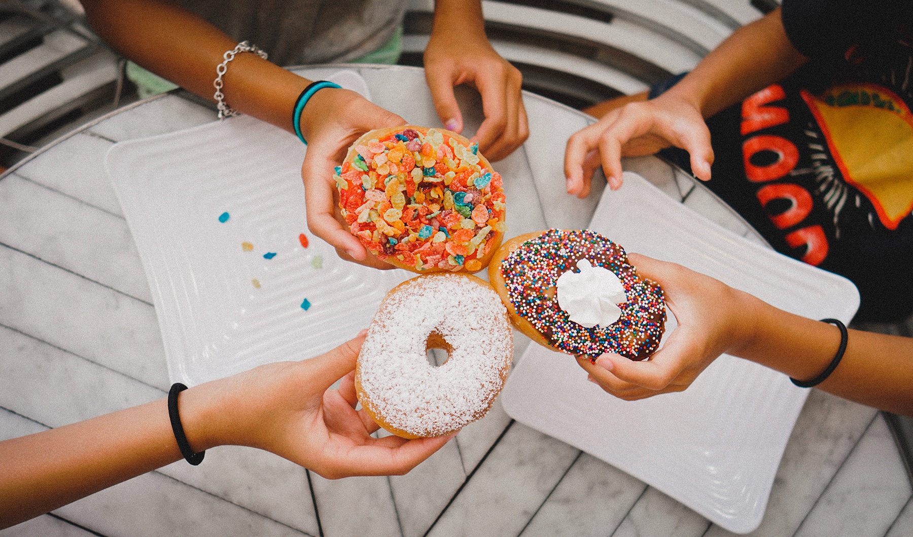 The Victor Verdae Lifestyle Friends Cheersing Donuts
